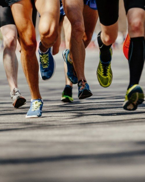 Runners at the Dorset Half Marathon and 10K in Burton Bradstock